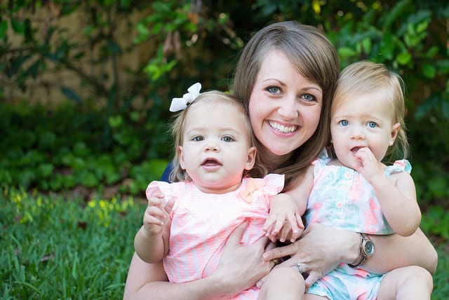 identical twins with their mom